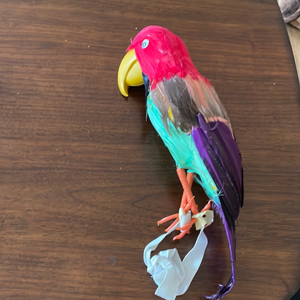 Parrot Prop with strap for shoulder or arm.